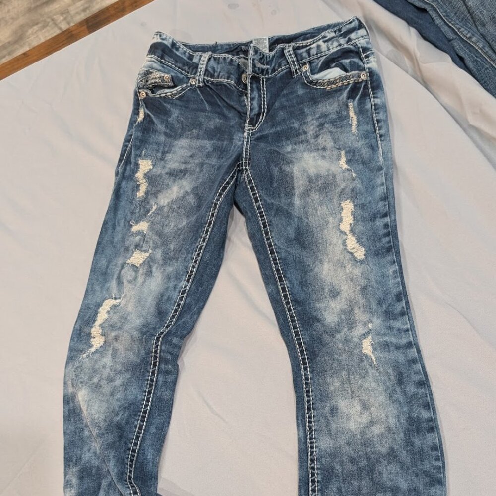 Maurices distressed boot cut jeans
